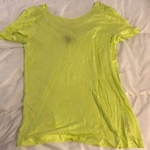 Bright yellow T-shirt.